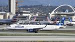N923JB @ KLAX - Arriving at LAX on 25L - by ToddRoyer
