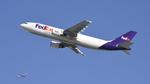 N657FE @ KLAX - Departing LAX on 25L - by ToddRoyer