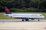 N324US @ KTPA - Delta Flight 1621 arrives on Runway 1L at Tampa International Airport following a flight from Detroit Metro-Wayne County International Airport - by Suncoast Spotter