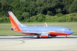 N910WN @ KTPA - Southwest Flight 2413 arrives on Runway 1L at Tampa International Airport following a flight from Bradley International Airport - by Suncoast Spotter