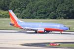 N697SW @ KTPA - Southwest Flight 3057 arrives on Runway 1L at Tampa International Airport following a flight from Chicago-Midway International Airport - by Suncoast Spotter