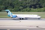 N956AT @ KTPA - AirTran Flight 1072 arrives on Runway 1L at Tampa International Airport following a flight from Akron-Canton Regional Airport - by Suncoast Spotter