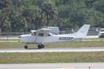 N393SP @ KSRQ - N393SP performs a touch and go on Runway 32 at Sarasota-Bradenton International Airport - by Suncoast Spotter