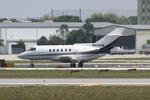 N904GR @ KSRQ - N904GR departs Runway 32 at Sarasota-Bradenton International Airport enroute to Indianapolis International Airport - by Suncoast Spotter