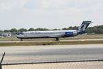 N926AT @ KSRQ - AirTran Flight 972 arrives on Runway 14 at Sarasota-Bradenton International Airport following a flight from Hartsfield-Jackson Atlanta International Airport - by Suncoast Spotter
