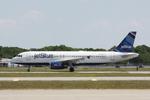 N653JB @ KSRQ - JetBlue Flight 346 departs Runway 32 at Sarasota-Bradenton International Airport enroute to John F Kennedy International Airport