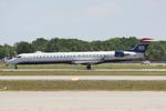 N926LR @ KSRQ - Mesa/US Air Flight 2662 departs Runway 32 at Sarasota-Bradenton International Airport enroute to Charlotte-Douglas International Airport - by Suncoast Spotter