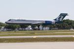 N990AT @ KSRQ - AirTran Flight 972 arrives on Runway 32 at Sarasota-Bradenton International Airport following a flight from Hartsfield-Jackson Atlanta International Airport - by Suncoast Spotter