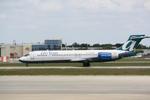 N978AT @ KSRQ - AirTran Flight 1165 arrives on Runway 14 at Sarasota-Bradenton International Airport following a flight from Chicago-Midway International Airport - by Suncoast Spotter