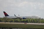 N588NW @ KRSW - Delta Flight 719 arrives on Runway 24 at Southwest Florida International Airport following flight from Detroit Metro Airport