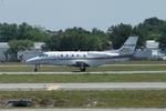 N497TM @ KSRQ - Beechcraft Beechjet departs Runway 32 at Sarasota-Bradenton International Airport enroute to Chicago-Midway International Airport - by Suncoast Spotter