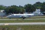 N44FG @ KSRQ - Elite Jet Flight 44  departs Runway 32 at Sarasota-Bradenton International Airport - by Suncoast Spotter