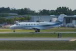 N75HU @ KSRQ - Elite Jet Flight 75 departs Runway 32 at Sarasota-Bradenton International Airport enroute to Montreal-Trudeau International Airport - by Suncoast Spotter