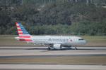 N701UW @ KTPA - American Flight 1944 arrives on Runway 1L at Tampa International Airport following flight from Reagan National Airport - by Suncoast Spotter