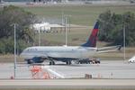 N803DN @ KTPA - Delta Boeing 737 parked on the north ramp at Tampa International Airport - by Suncoast Spotter