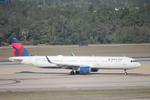 N394DX @ KTPA - Delta Flight 2852 arrives on Runway 1L at Tampa International Airport following flight from Detroit Metro Airport - by Suncoast Spotter