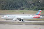 N195UW @ KTPA - American Flight 2898 taxis at Tampa International Airport prior to flight to Charlotte-Douglas International Airport - by Suncoast Spotter
