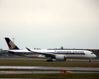 9V-SMZ @ EKCH - 9V-SMZ taxi for takeoff rw 22R - by Erik Oxtorp