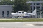 N224DG @ KSRQ - Cirrus SR-22 arrives on Runway 32 at Sarasota-Bradenton International Airport - by Suncoast Spotter