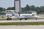 N741E @ KSRQ - Learjet 45 taxis for departure at Sarasota-Bradenton International Airport - by Suncoast Spotter