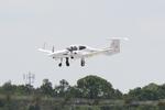 N825TD @ KSRQ - Diamond Twin Star arrives on Runway 32 at Sarasota-Bradenton International Airport - by Suncoast Spotter