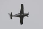 N59PX @ KSRQ - Cirrus SR-22 flies over Sarasota-Bradenton International Airport - by Suncoast Spotter
