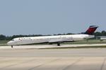 N965DL @ KSRQ - Delta Flight 1678 arrives on Runway 14 at Sarasota-Bradenton International Airport following a flight from Hartsfield-Jackson Atlanta International Airport - by Suncoast Spotter