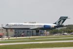 N940AT @ KSRQ - AirTran Flight 296 arrives at Sarasota-Bradenton International Airport following a flight from Hartsfield-Jackson International Airport - by Suncoast Spotter