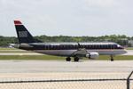 N803MD @ KSRQ - US Air Flight 3396 operated by Republic taxis for departure at Sarasota-Bradenton International Airport - by Suncoast Spotter