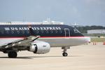 N809MD @ KSRQ - US Air Flight 3396 prepares for flight at Sarasota-Bradenton International Airport - by Suncoast Spotter
