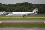 N155SJ @ KSRQ - Learjet 55 taxis for departs Sarasota-Bradenton International Airport - by Suncoast Spotter