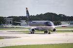 N811MD @ KSRQ - US Air Flight 3327 operated by Republic arrives at Sarasota-Bradenton International Airport following a flight from Reagan National Airport - by Suncoast Spotter