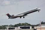 N956LR @ KSRQ - US Air Flight 2607 operated by Mesa departs Sarasota-Bradenton International Airport enroute to Charlotte-Douglas International Airport - by Suncoast Spotter