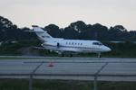 N871QS @ KSRQ - Execjet Flight 871 arrives at Sarasota-Bradenton International Airport following a flight from Jacksonville International Airport - by Suncoast Spotter