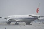 B-2033 @ KSFO - Raining departing runeay 10 SFO 2025 - by Clayton Eddy