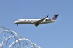 N929EV @ KORD - CRJ2 SkyWest/United Express Bombardier CRJ-200ER N929EV arriving 28C KORD - by Mark Kalfas