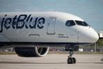 N3162J @ KRSW - JetBlue A220 parked on the north ramp at Southwest Florida International Airport