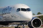 N3162J @ KRSW - JetBlue A220 parked on the north ramp at Southwest Florida International Airport