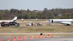 N44GX @ KPDK - Global Express, with HUGE tow trucks preparing to hook up to the jet after the runway excursion the previous day - by AviationLover50