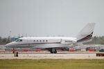 N626QS @ KRSW - NetJets Flight 626 arrives on Runway 6 at Southwest Florida International Airport following flight from Marsh Harbour Airport - by Suncoast Spotter