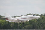 N947QS @ KRSW - NetJets Flight 947 departs Southwest Florida International Airport enroute to Lakeland-Linder International Airport - by Suncoast Spotter