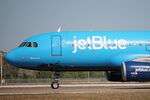 N779JB @ KRSW - JetBlue Flight 366 taxis at Southwest Florida International Airport prior to flight to Boston-Logan International Airport