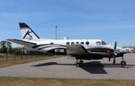 N711RE @ KDED - Beech A100 - by Mark Pasqualino