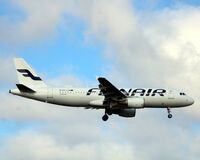 OH-LXM @ EKCH - OH-LXM landing rw 04L - by Erik Oxtorp