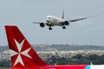 A6-EPP @ LMML - A6-EPP landing RWY 13 with 9H-NEB in the foreground - by Nicolai Schembri