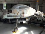 A-549 - FMA IA-58A Pucara  (outer wings dismounted) awaiting restoration at the IWM and other collections, Duxford - by Ingo Warnecke