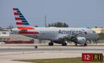 N714US @ KMIA - AAL A319 zx mia-orf - by FloridaMetal