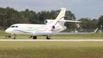N711PV @ KORL - Falcon 7X zx - by FloridaMetal