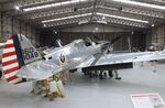 G-CIIO @ EGSU - Curtiss P-40C Warhawk undergoing maintenance at the IWM and other collections, Duxford