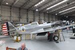 G-CIIO @ EGSU - Curtiss P-40C Warhawk undergoing maintenance at the IWM and other collections, Duxford - by Ingo Warnecke